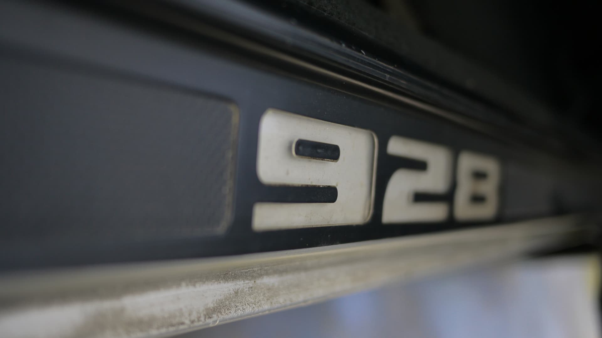 The 928 badge on the rear panel